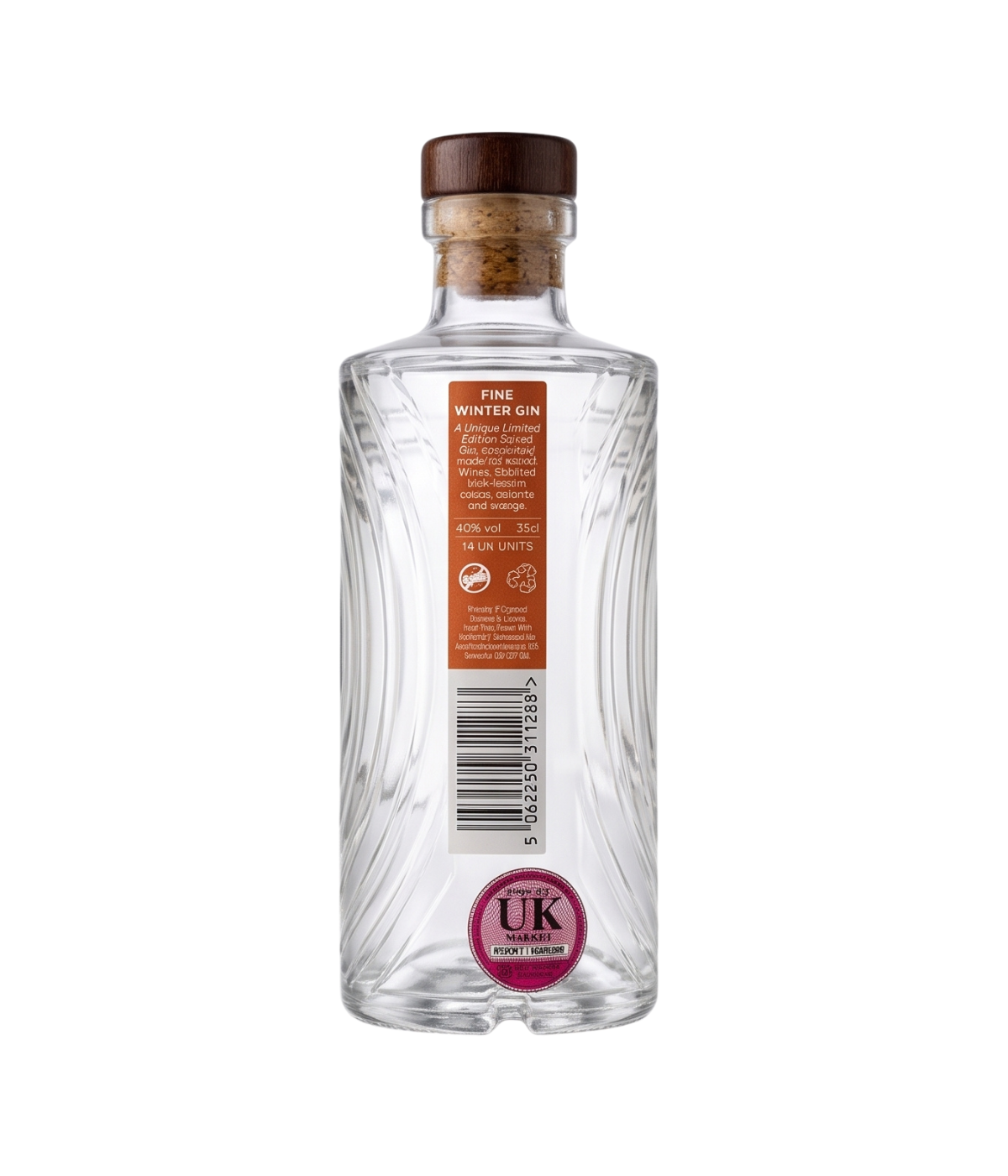 A clear glass bottle of Fine Winter Gin with a brown cork stopper, featuring a white and orange label with a pink UK Gold Medal seal, shown against a plain white background.