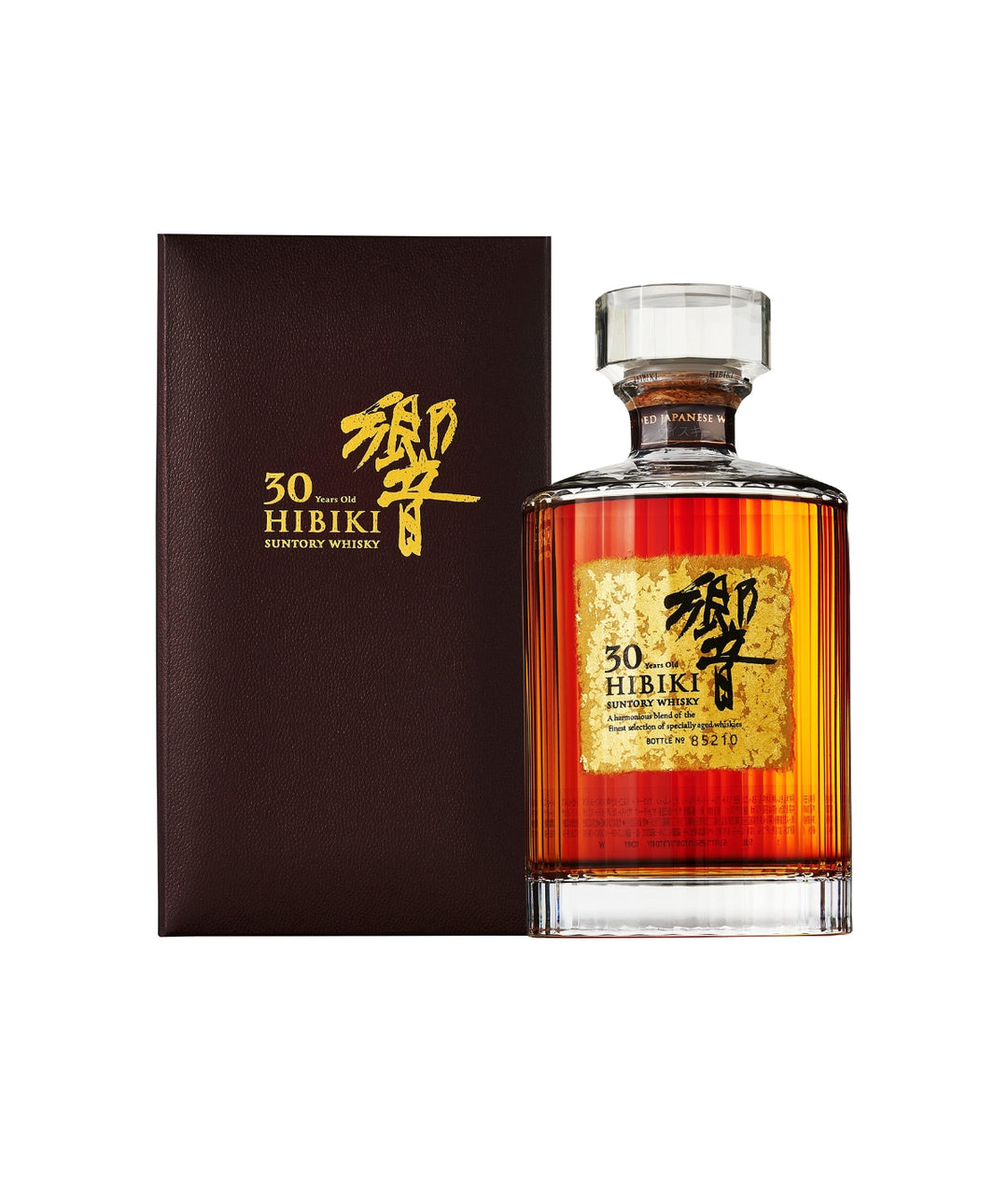 A bottle of Hibiki 30 Year Old Japanese Whiskey next to its dark brown presentation box, both featuring gold and black branding on a white background.