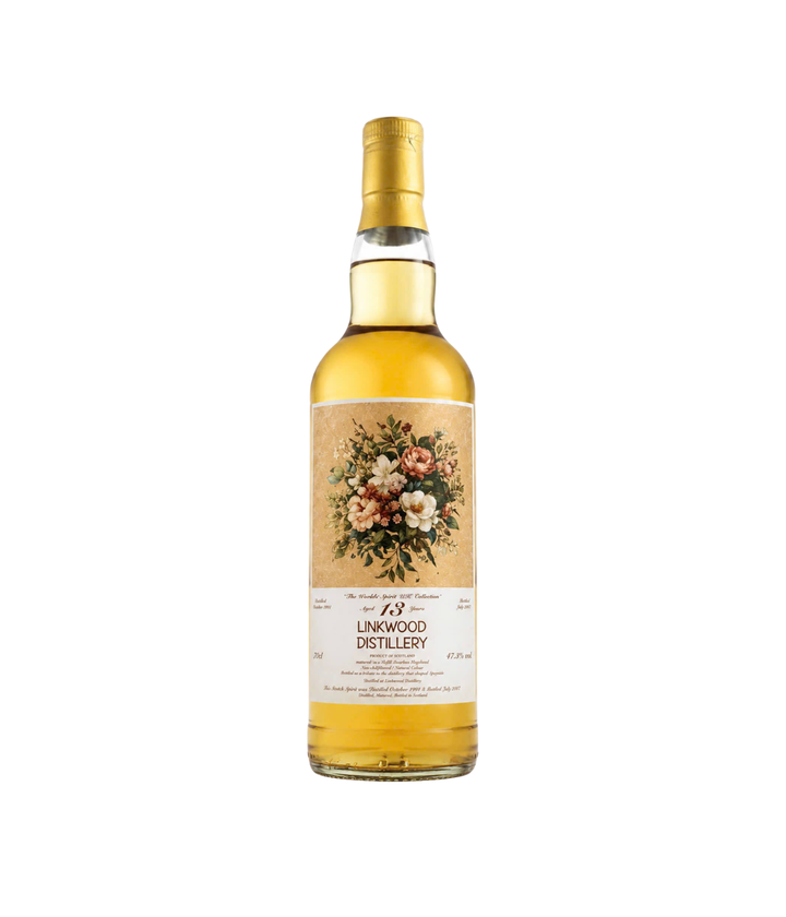 Whisky bottle with floral label on a white background