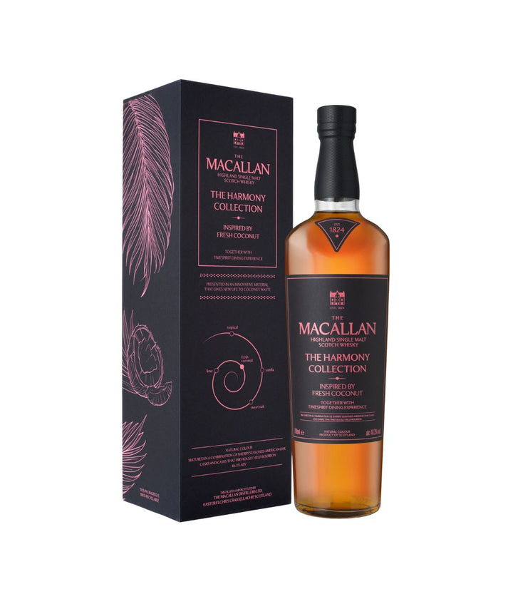 A bottle of Macallan The Harmony Collection 12 Year Single Malts Scotch whisky next to its black packaging box with pink botanical illustrations, on a plain white background.
